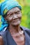 A happy old African woman with crinkle eyes