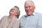 Happy old couple laugh until one cries