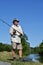 Happy Old Retiree Adult Male Fisherman With Fishing Rod Outdoors