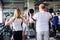 Happy older married couple doing exercises with dumbbells