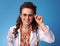 Happy paediatrist woman in white medical robe on blue