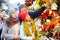 Happy parents with teenage girl at counter with Poinsettia and