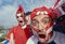 happy peruvian stadium soccer,futbol, fans commemorating victory, with the flag of peru swinging ,face painting- may 2018