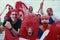 happy peruvian stadium soccer,futbol, fans commemorating victory, with the flag of peru swinging ,face painting- may 2018