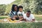Happy picnic relax black people family with son in garden