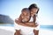 Happy, piggyback and portrait of black couple at beach for valentines day vacation, holiday or adventure. Smile, love