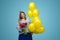 Happy plump woman with balloons