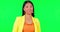 Happy, pointing and face of a woman on a green screen for recruitment, hiring and human resources. Smile, decision and