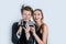 Happy portrait of Couple holding Video camera and Record clip video