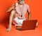 Happy portrait of trendy pensioner enjoying the use of new laptop