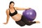 Happy pregnant with pilates ball