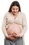 Happy pregnant woman holding heart-eyes emoji and tummy