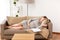 Happy pregnant woman sleeping on sofa at home