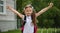 Happy pretty school girl holding backpack. schooler going to school, enjoying studying. School, education concept