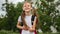 Happy pretty school girl holding backpack. schooler going to school, enjoying studying. School, education concept