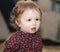 Happy & Pretty Toddler with Brown Eyes & Flowered Dress