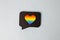 Happy Pride month banner for lgbt rights or social issues event. Colorful rainbow heart  in black social media interaction cloud,