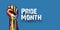 Happy pride month horizontal banner with Rised LGBT fist colored in lgbt flag isolated on blue background. LGBT Pride