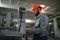 Happy Professional Heavy Industry Engineer Worker Wearing Uniform, and Hard Hat in a Steel Factory. Smiling Industrial