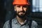 Happy Professional Heavy Industry Engineer Worker Wearing Uniform, and Hard Hat in a Steel Factory. Smiling Industrial