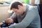 Happy proud young father with newborn baby daughter, family portrait togehter