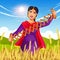 Happy Punjabi woman celebration on a wheat grains field for Baisakhi celebrations