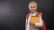 Happy pupil holding books with Portugal flag, ready to learn foreign language