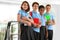 Happy pupils in school uniform with backpacks