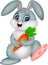 Happy rabbit cartoon holding carrot