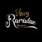 Happy Ramadan Kareem greeting card. Handmade golden and white lettering