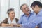Happy retired Asian senior eldery couple consult with personal financial advisor or real estate agent. Retirement investment
