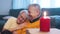 Happy retired couple enjoying valentines day with candle lights. Love romance and dating at old age