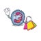 A happy rich neutrophil cell waving and holding Shopping bag