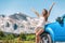 Happy road trip tourist girl enjoying driving sport car on summer travel adventure freedom vacation. Asian woman with