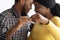 Happy Romantic Black Spouses Holding Keys From Their New Home, Closeup Shot