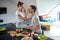 Happy romantic cople having breakfast together