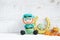 Happy Saint Patrick`s day. A crochet of a cute Leprechaun crochet doll and lucky charm, shamrock cookies and a lot of gold