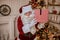 Happy Santa Claus brought gifts to children.  New year and Merry Christmas holidays concept