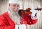 Happy santa playing violin