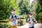 Happy schoolchildren with face masks run from the joy of returning to school during the Covid-19 quarantine