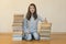 Happy schoolgirl with books in the room