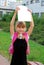 Happy schoolgirl with graduation certificate