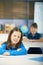 Happy schoolgirls in classroom