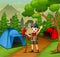 Happy scout boy camping in forest