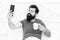 Happy selfie. Modern life new technology. Technology concept. Pleasant conversation. Good morning. Bearded man using