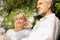 Happy senior caucasian couple looking ahead feeling hopeful, looking forward to the bright future, saving insurance, healthy