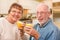 Happy Senior Couple Enjoying Their Glasses of Orange Juice