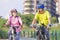 Happy  senior couple exercising with bicycles in the city park