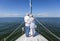 Happy Senior Couple On Front of a Sail Boat