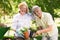 Happy senior couple gardening